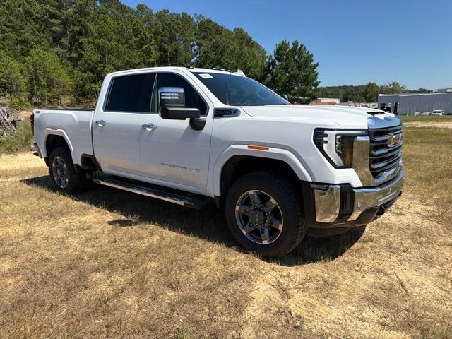 2026 GMC Sierra 2500 HD SLT in Summit White — front three-quarter view