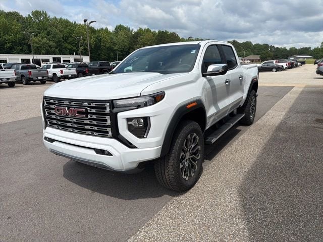 2026 GMC Canyon Denali in Summit White — front three-quarter view