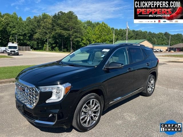 2023 GMC Terrain Denali in Ebony Twilight Metallic — front three-quarter view